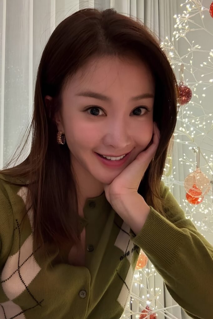 Smiling woman with natural, minimal makeup