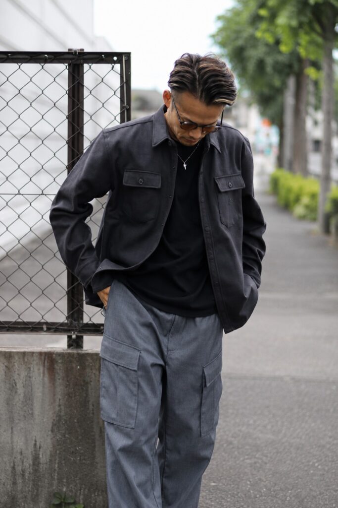 Black overshirt over a black tee