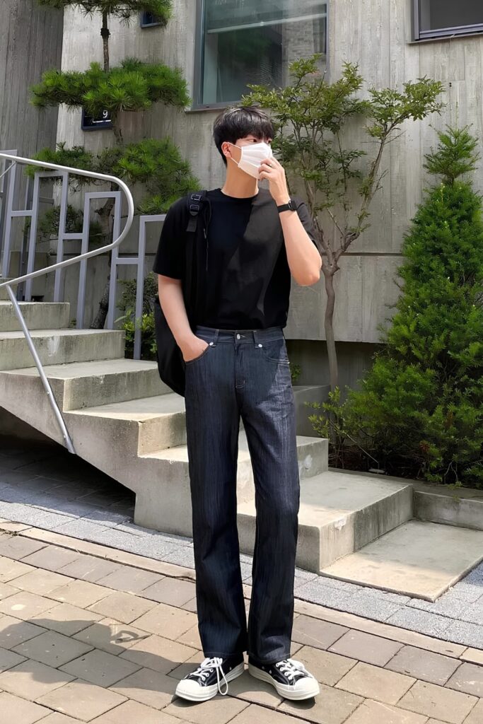 Black tee with black straight jeans and sneakers