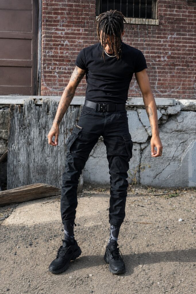 Black cargo trousers with a fitted top
