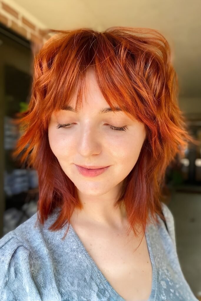 Choppy Copper Curtain Bangs