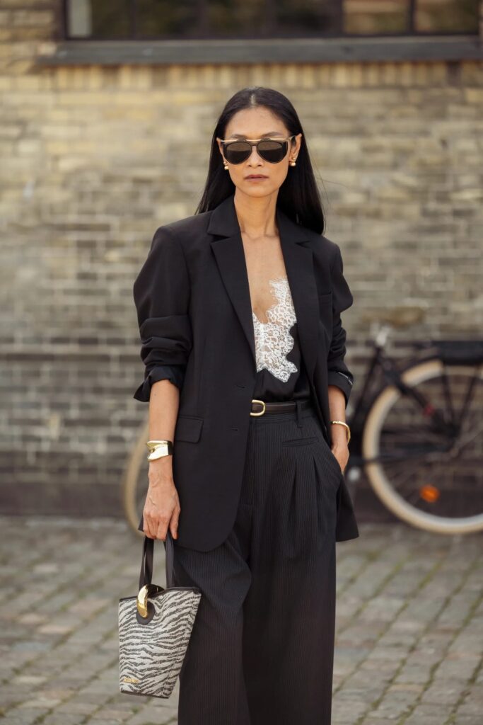 Lace camisole under a relaxed blazer