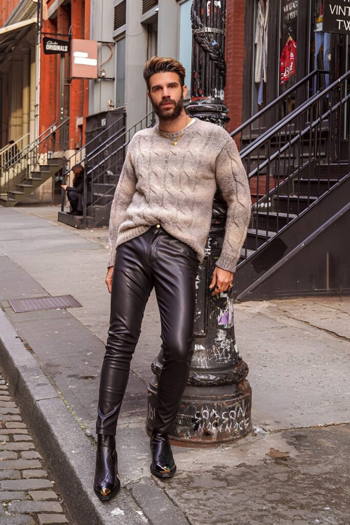Black leather trousers with a heavy knit