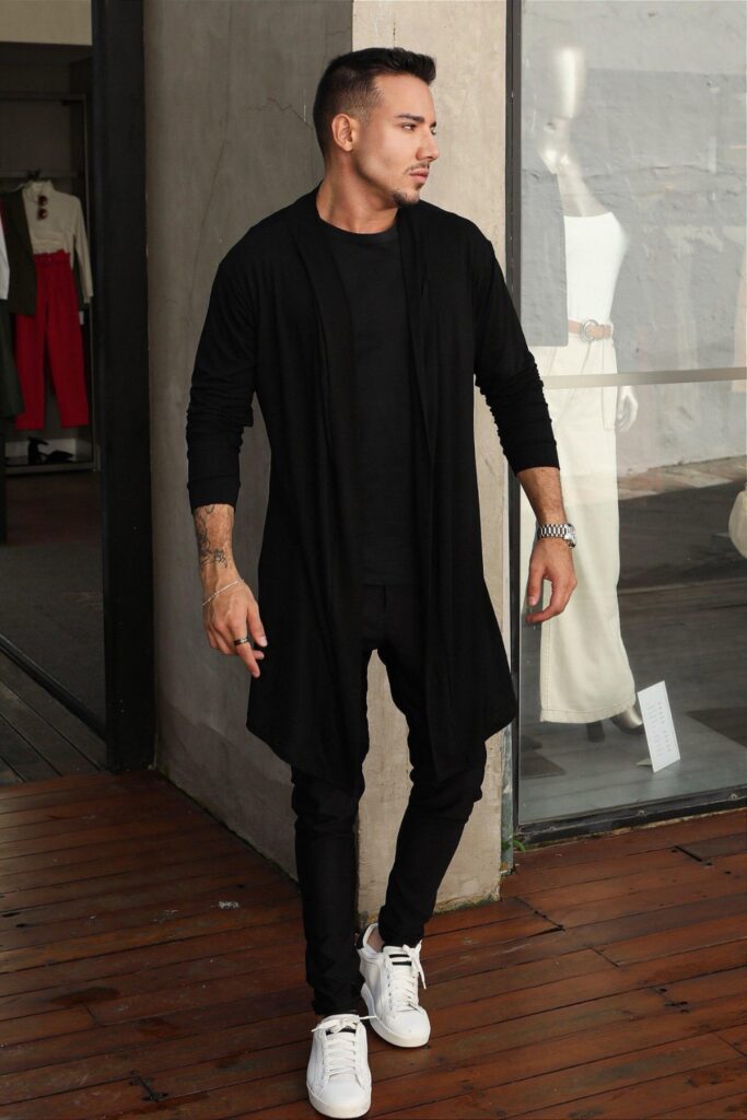 Long black cardigan with slim trousers