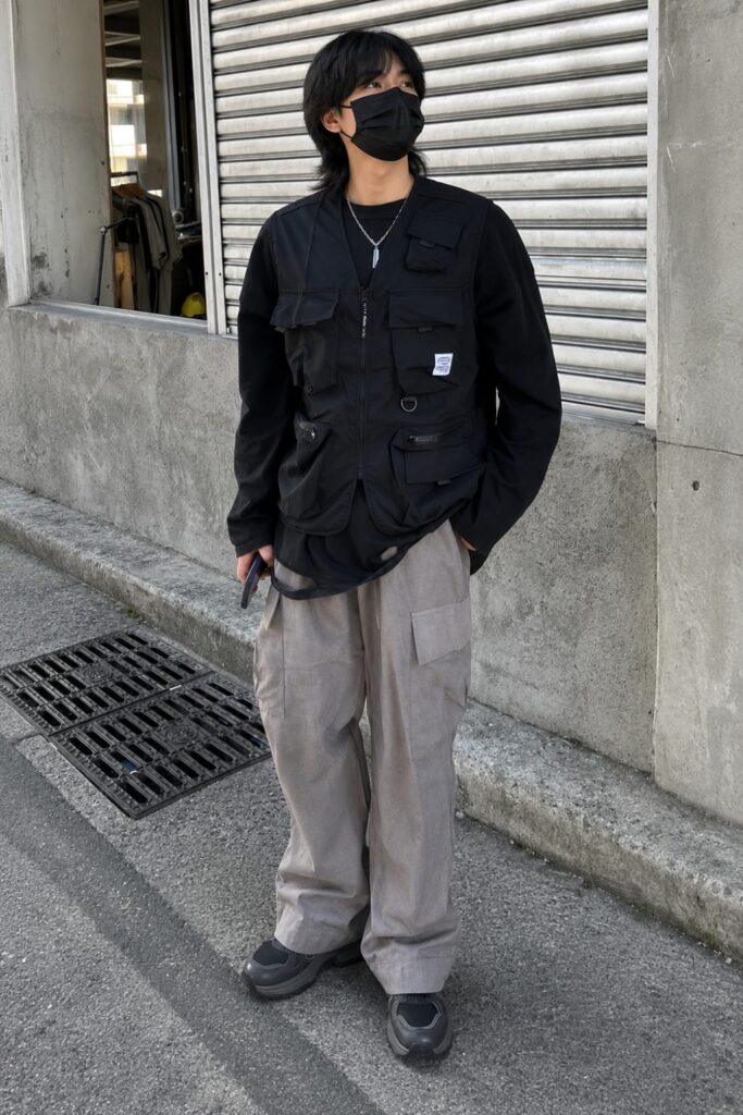 Utility vest over a long sleeve top