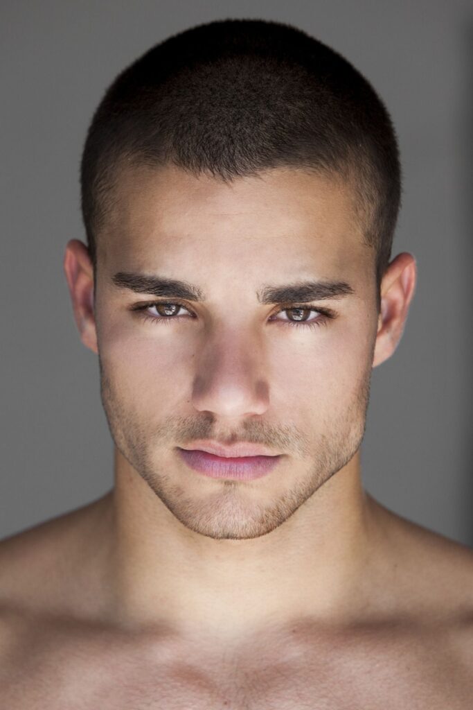 Five o'clock shadow with a short haircut