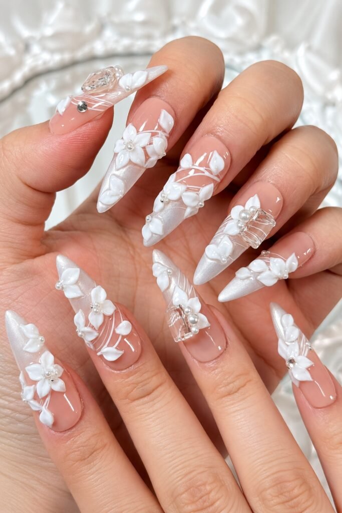 Long nails with 3D white floral designs