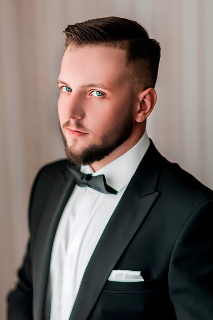 Classic side part with a short boxed beard