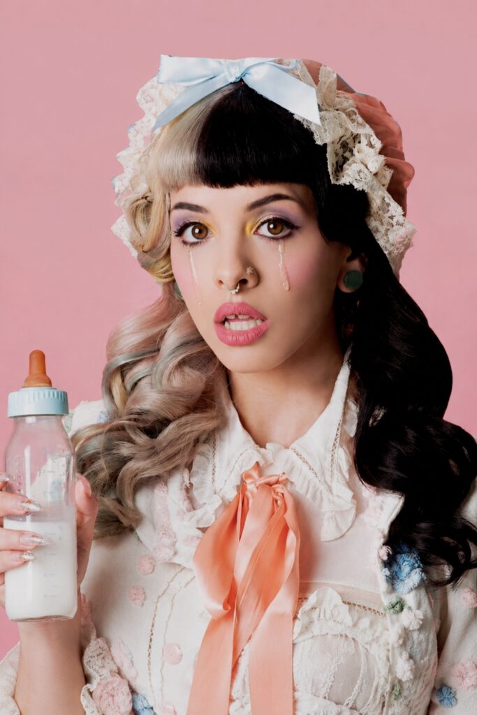 Pink doll makeup with rosy cheeks