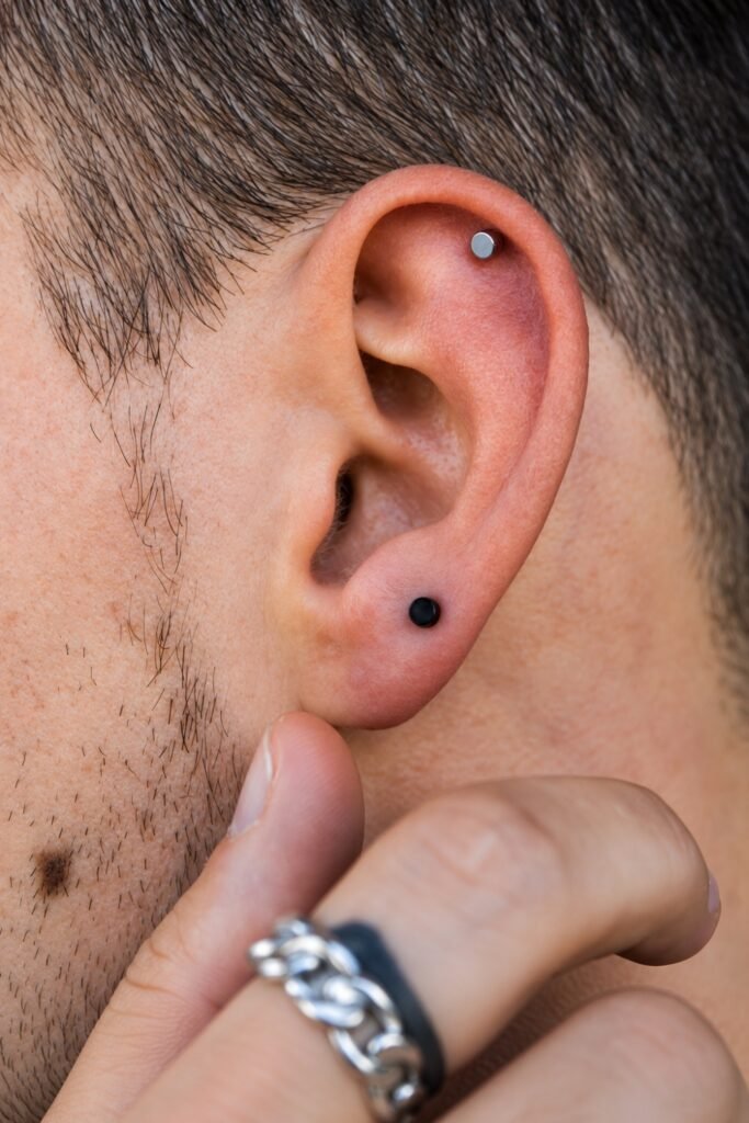 Flat piercing in the upper ear