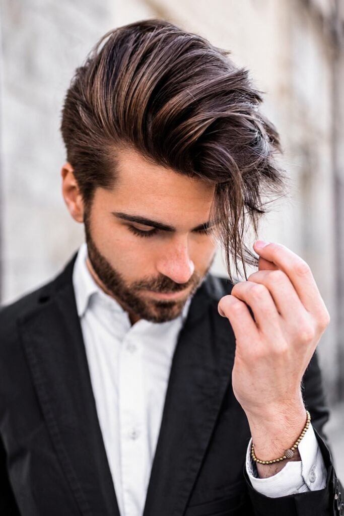 Man in a suit with a layered side sweep