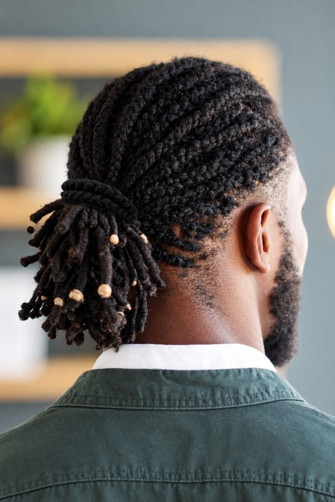 Loc bun with beads and cuffs