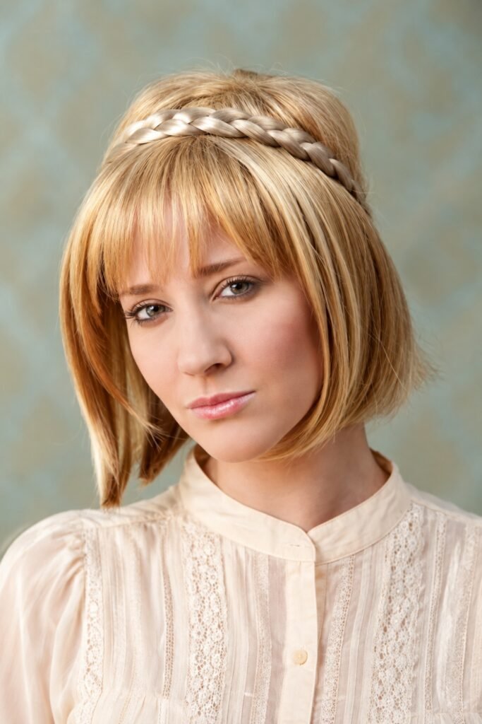 Blonde bob with a thin braided band