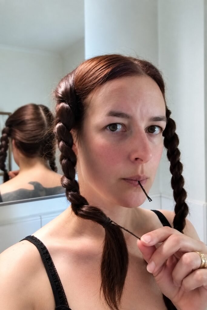 Short hair in two small braids
