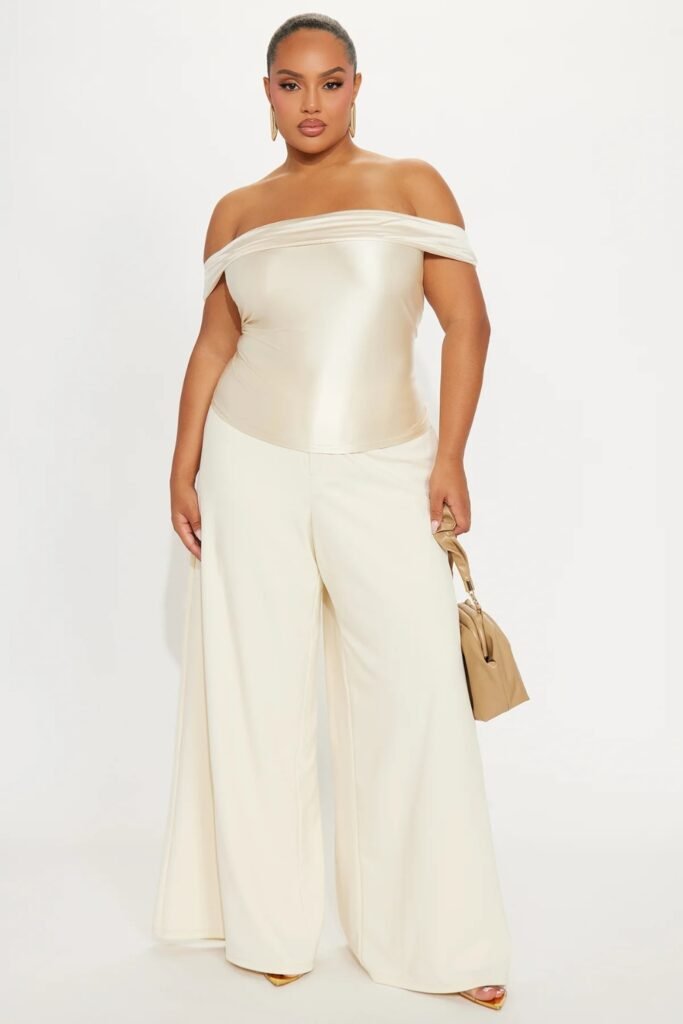 Plus-size off-shoulder top with wide trousers