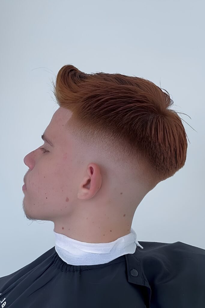 Red hair with a low fade