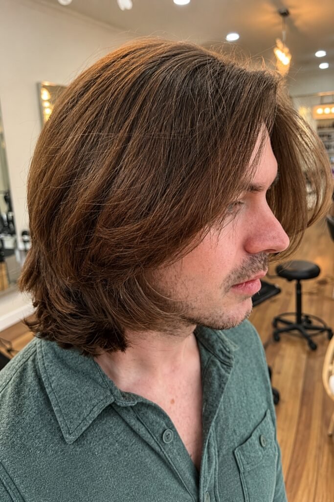 Shoulder-skimming layers on a man
