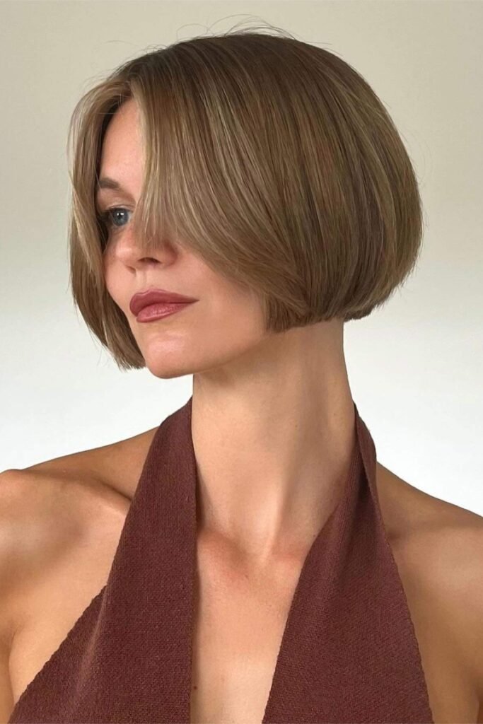 Side profile of a sleek pageboy-style bob