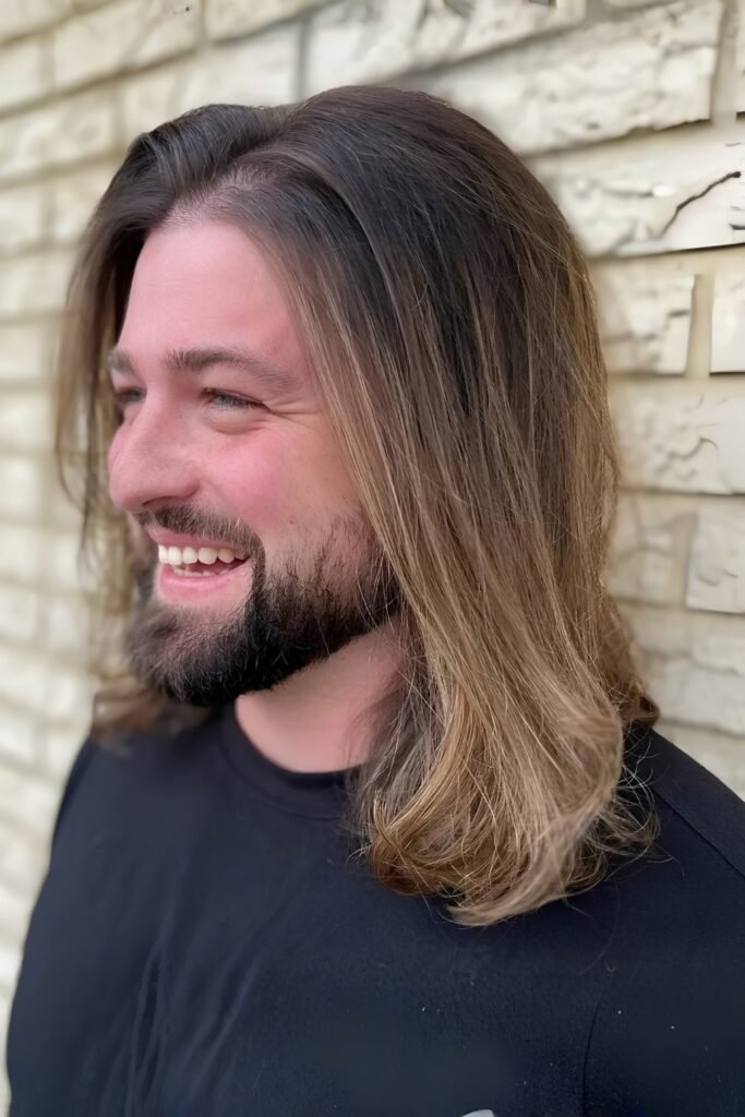 Sun-kissed brunette balayage on long hair
