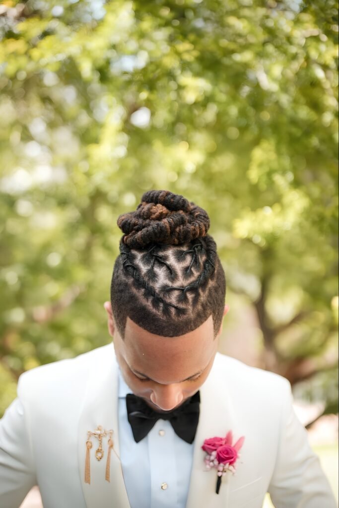 Wrapped loc bun hiding the hair tie