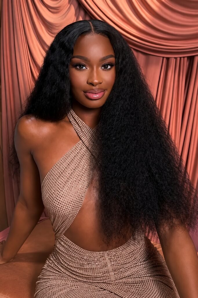 Long natural black hair with volume and a middle part