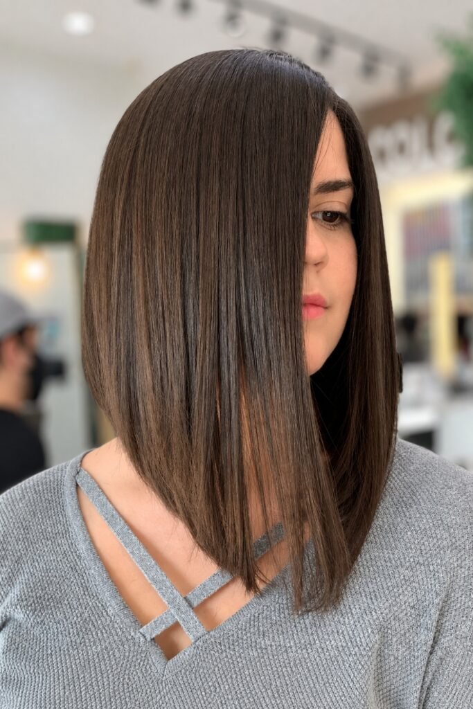 Back view of an asymmetric blunt lob in brown