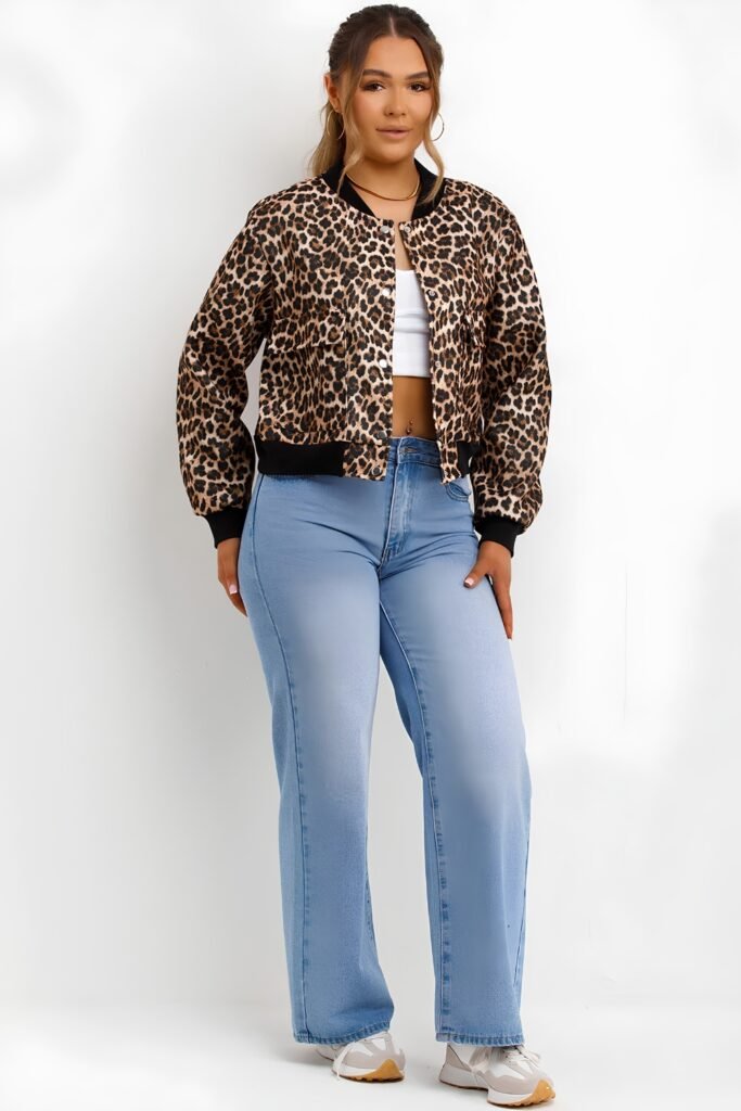 Woman in a cheetah-print bomber jacket with straight jeans