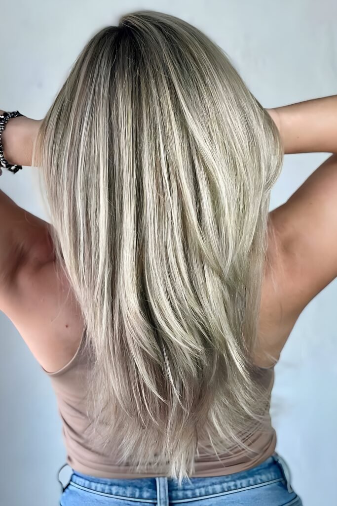 Back view of extra-long blonde layers with a full bottom
