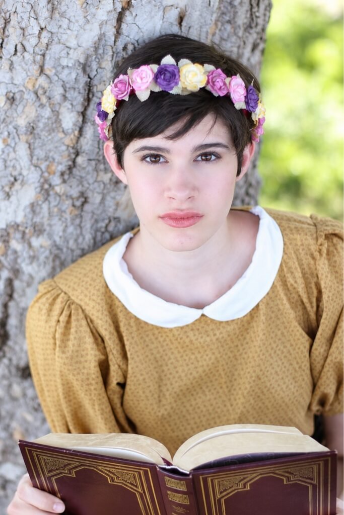 Fairy hairstyle: Half-Up Pixie with Curtain Fringe and Floral Clip