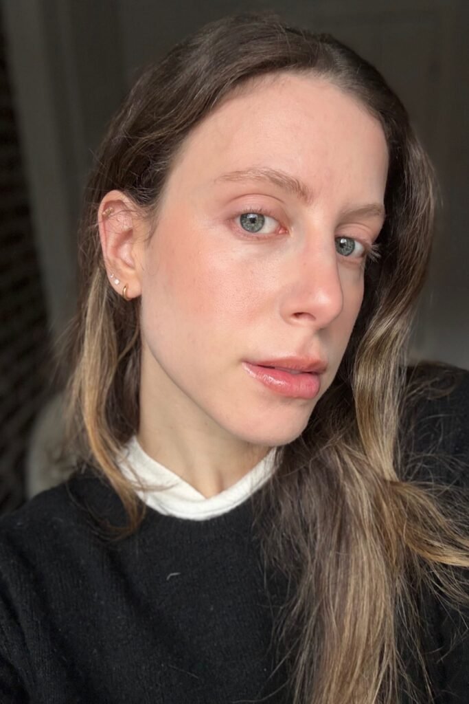 Woman with a soft rosy-brown lip and minimal makeup
