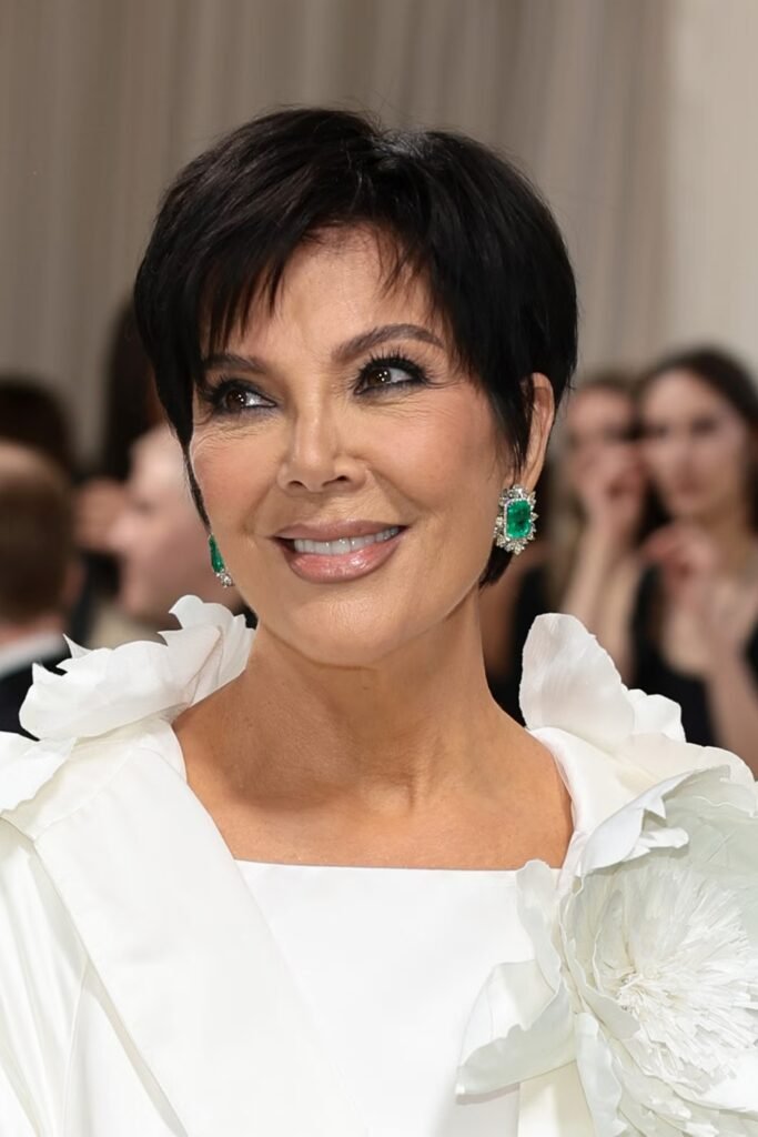 Woman with a soft tapered pixie and side bangs