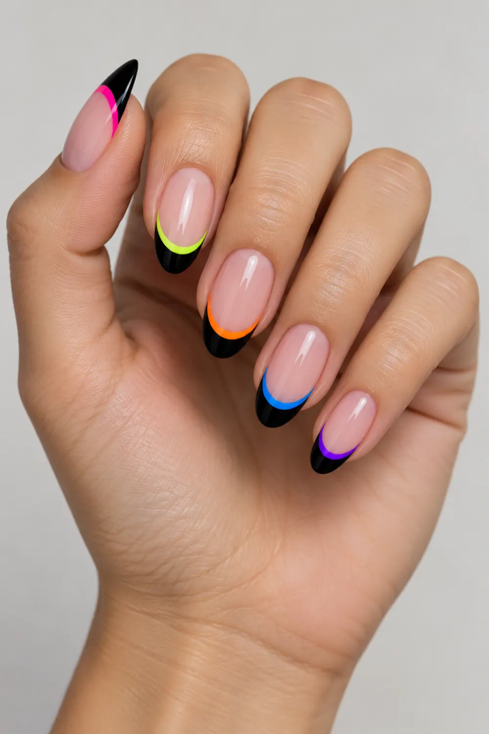 Modern black and neon French tip manicure