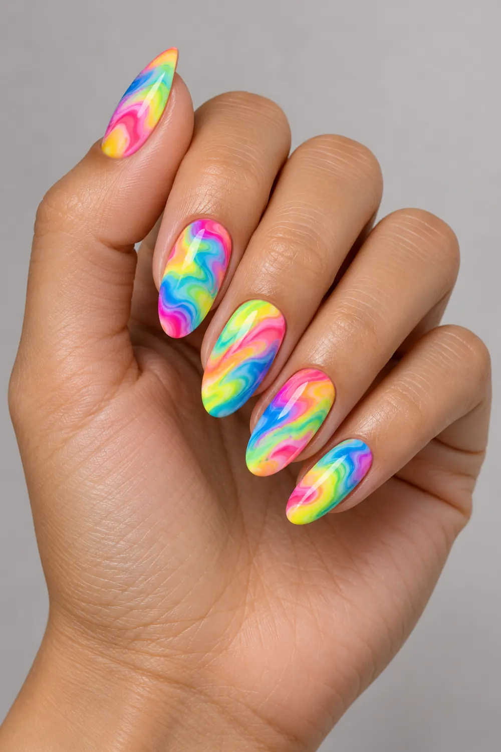 Rainbow neon marble nail design with swirling colors