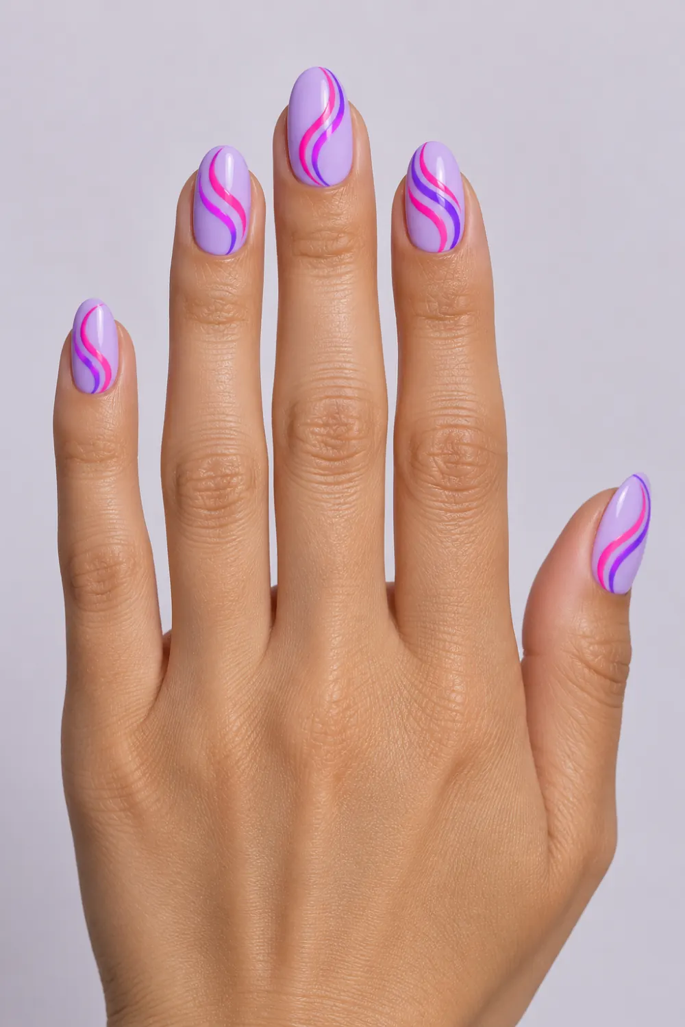Lilac nails with neon pink and purple swirls